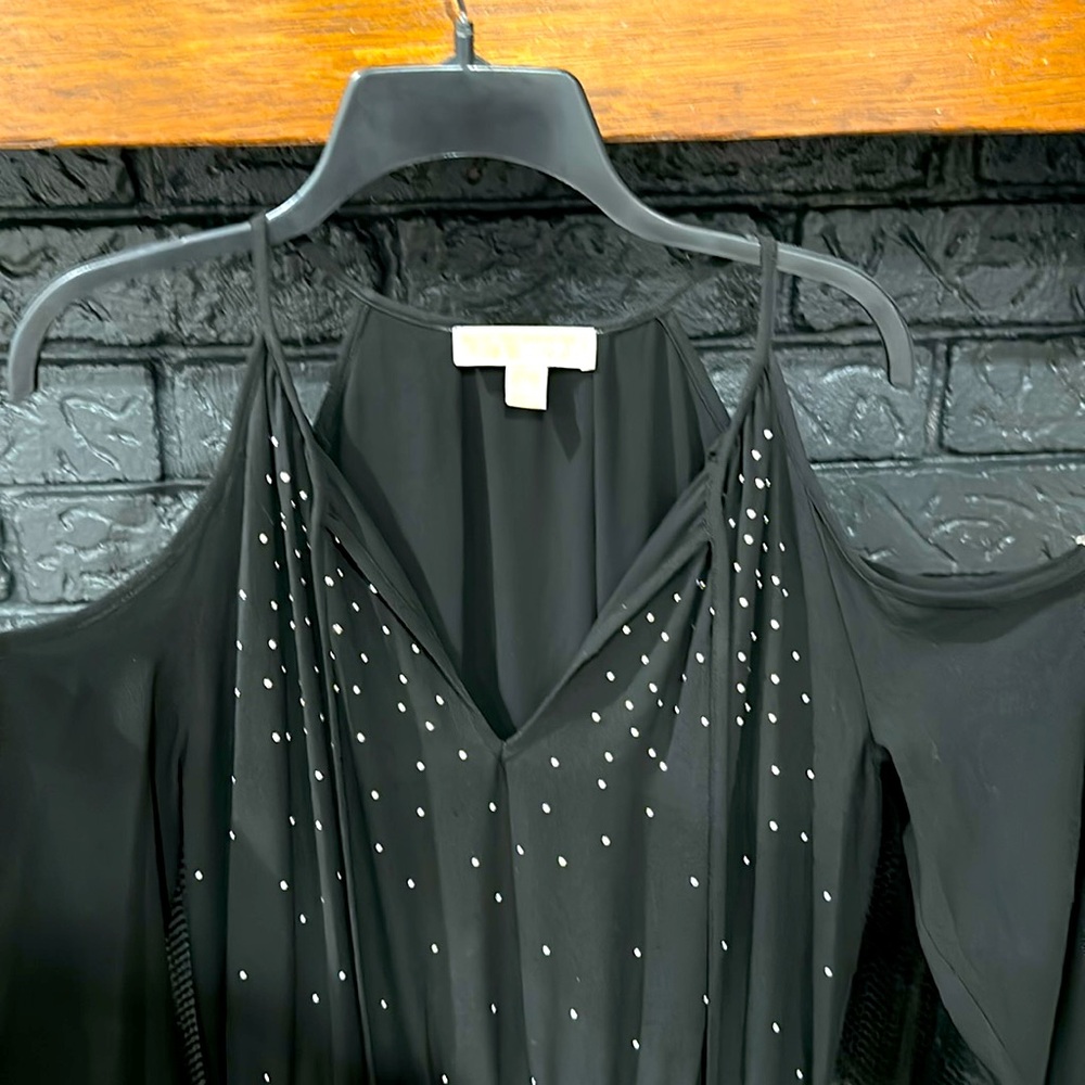 Michael Kors Black, V-neck, cold-shoulders, studded bodice with pleated skirt.